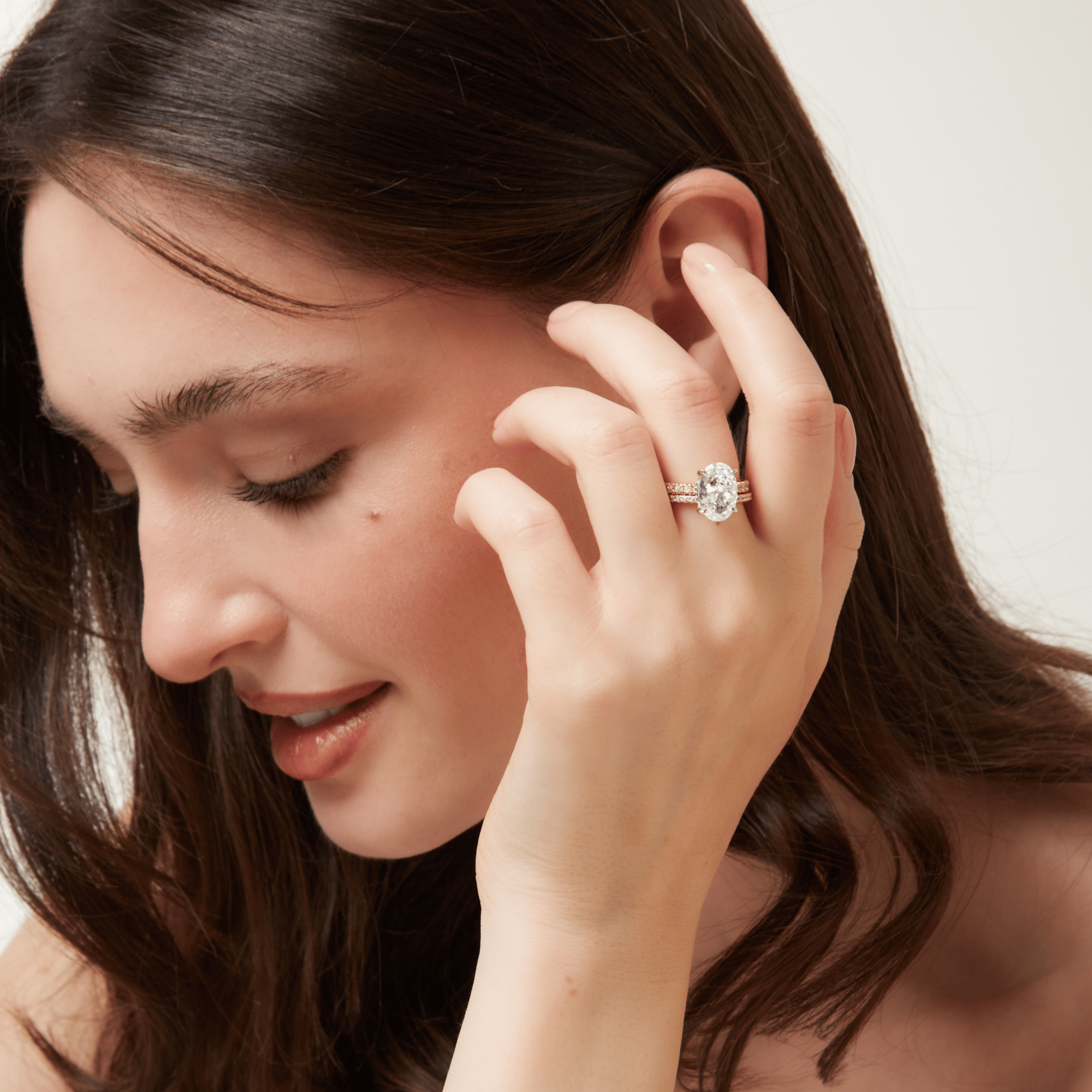 Promise Sparkle Oval Ring stacked with other rings versatile as an eternity band, wedding band or standout affordable luxury promise ring.