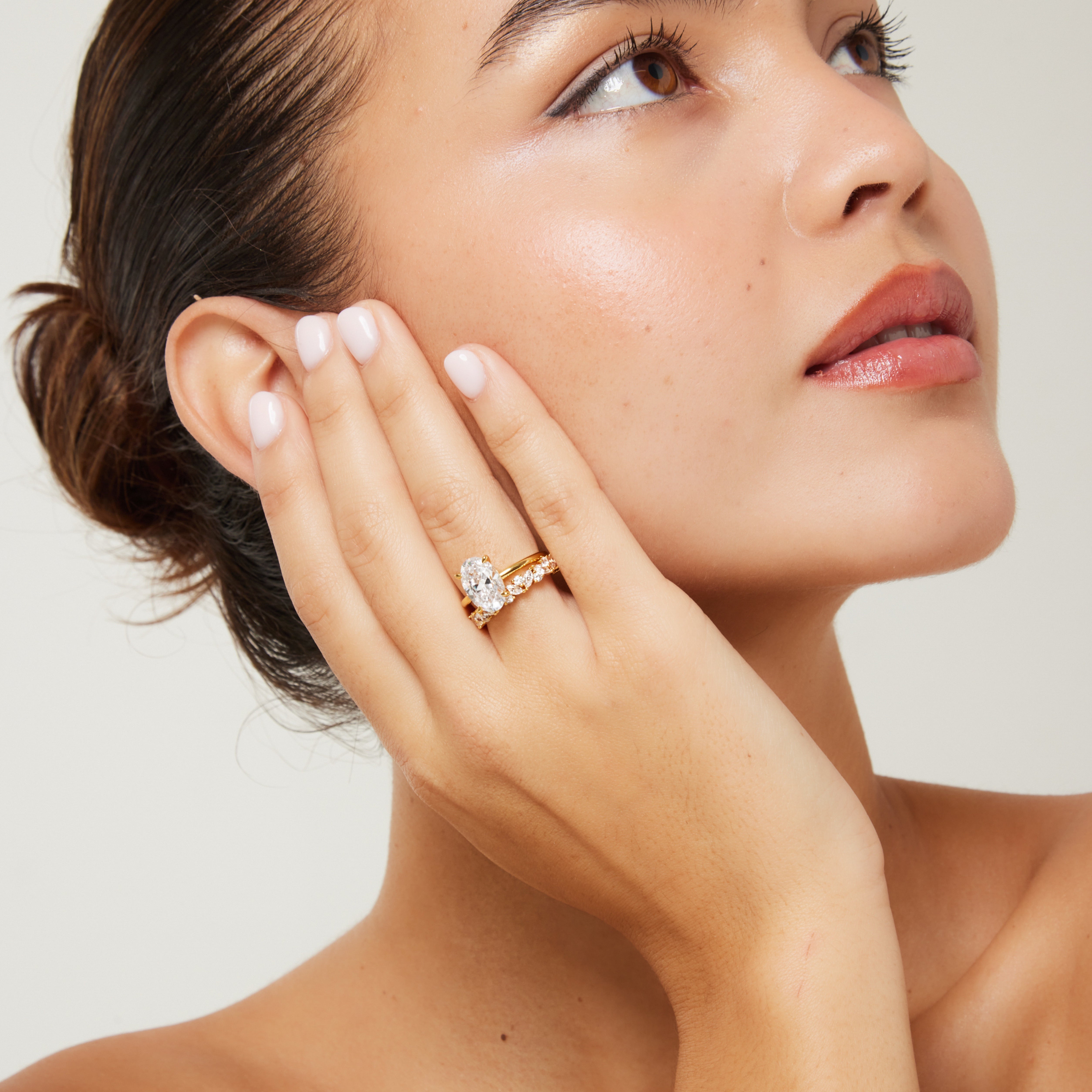 Promise Oval Ring worn on finger 3 ct oval centre stone, sleek band in gold vermeil a modern promise ring for her or minimalist wedding band.