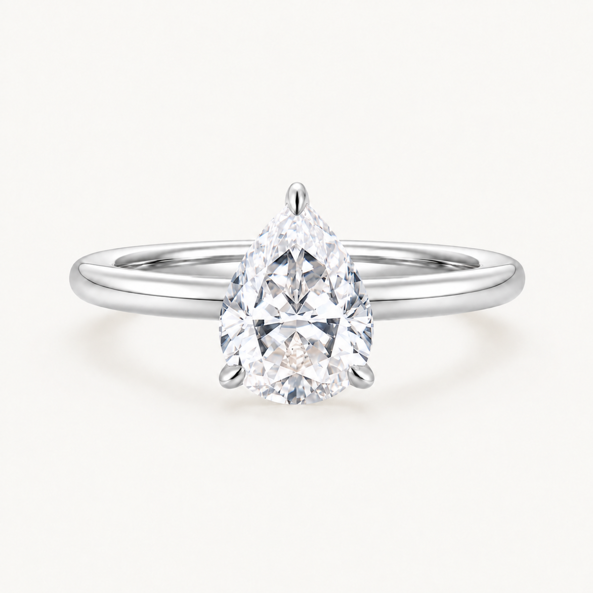 Promise Pear Cut Solitaire Ring