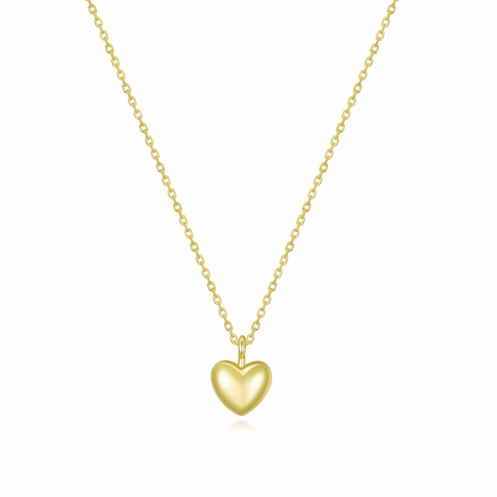 Gold heart-shaped pendant necklace on a white background