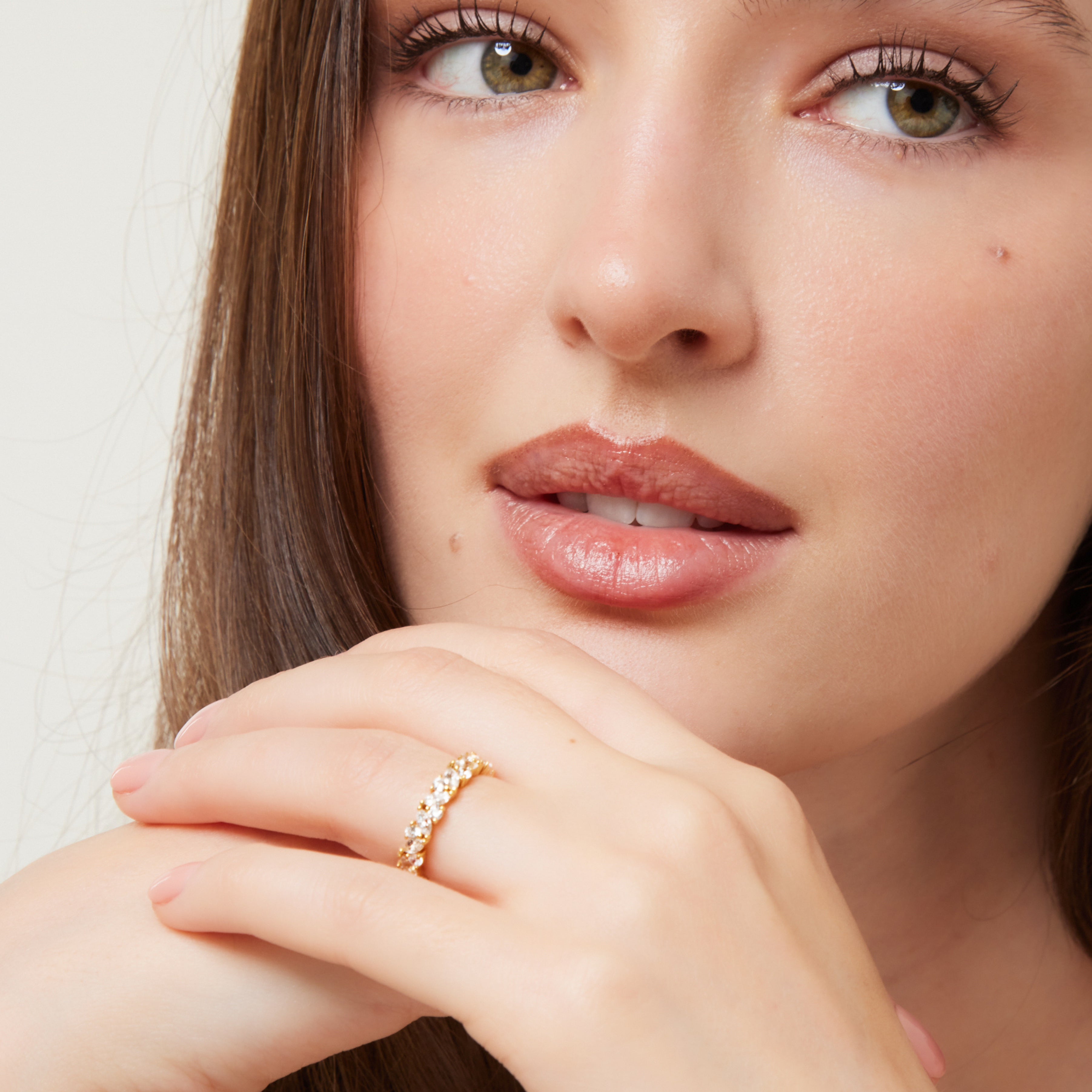 close‑up of Promise Cluster Ring showcasing marquise and round‑cut simulants set by hand in rhodium‑plated sterling silver, modern promise ring or meaningful gift