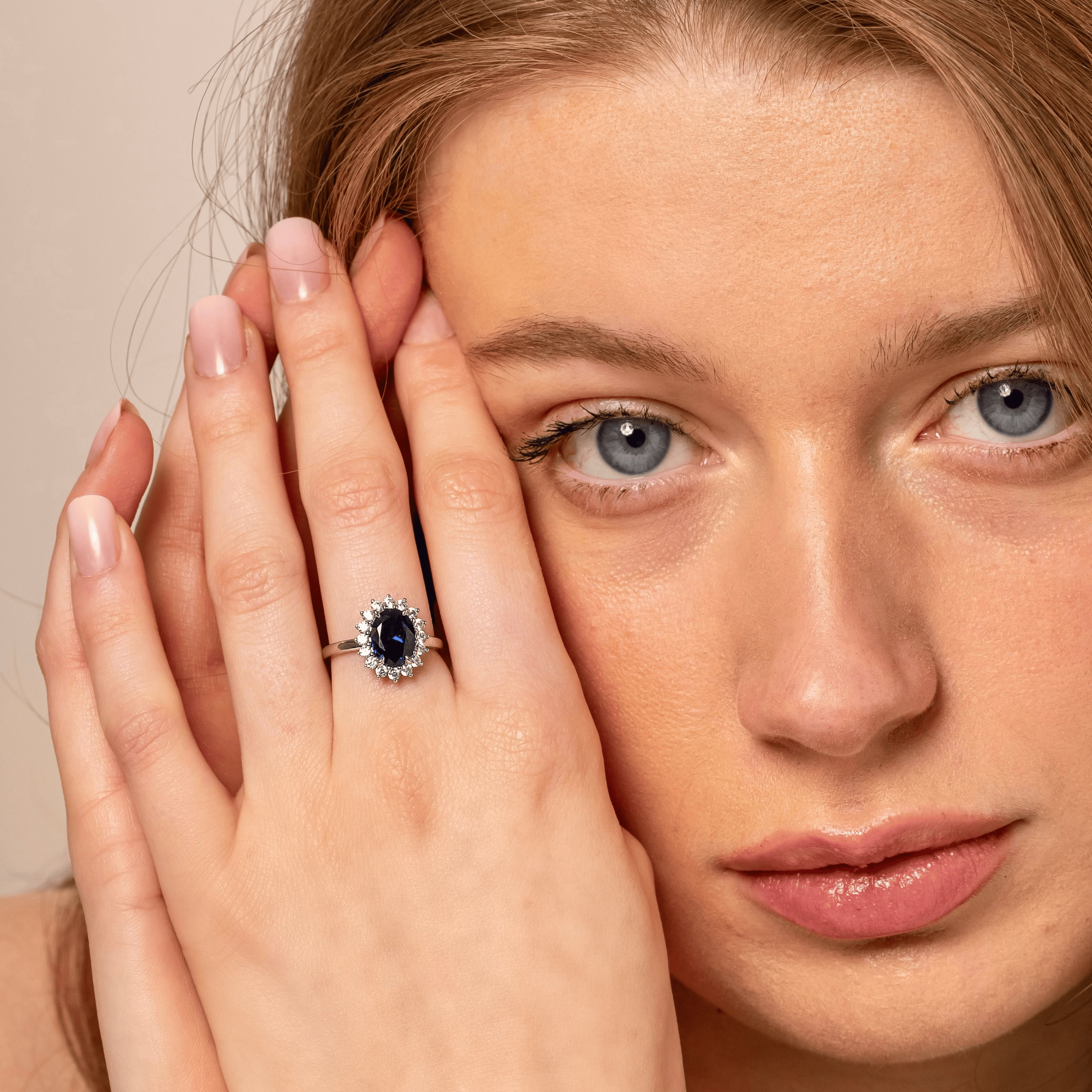 Close-up of sapphire cluster promise ring – elegant affordable jewellery gift