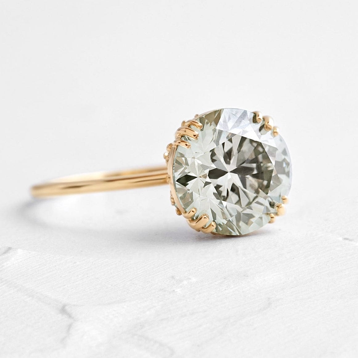 The Promise Ring Co. Circle Solitaire diamond simulant ring. Unique hidden halo. Shop in 18ct Gold or Sterling Silver.