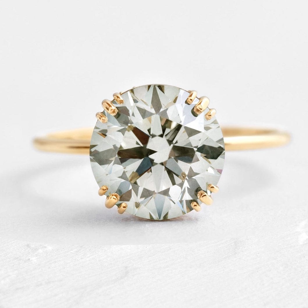 The Promise Ring Co. Circle Solitaire diamond simulant ring. Unique hidden halo. Shop in 18ct Gold or Sterling Silver.