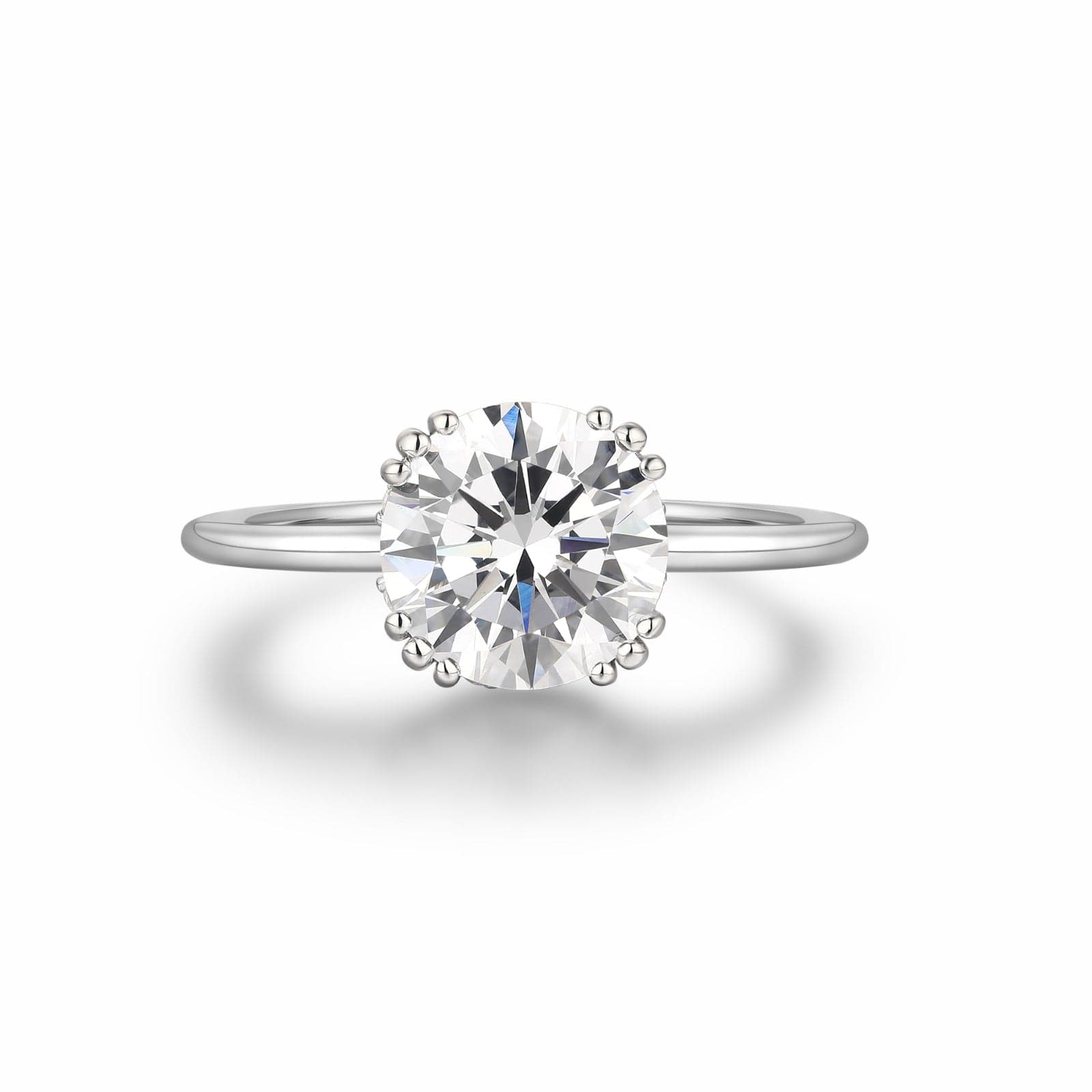 The Promise Ring Co. Circle Solitaire diamond simulant ring. Unique hidden halo. Shop in Sterling Silver.