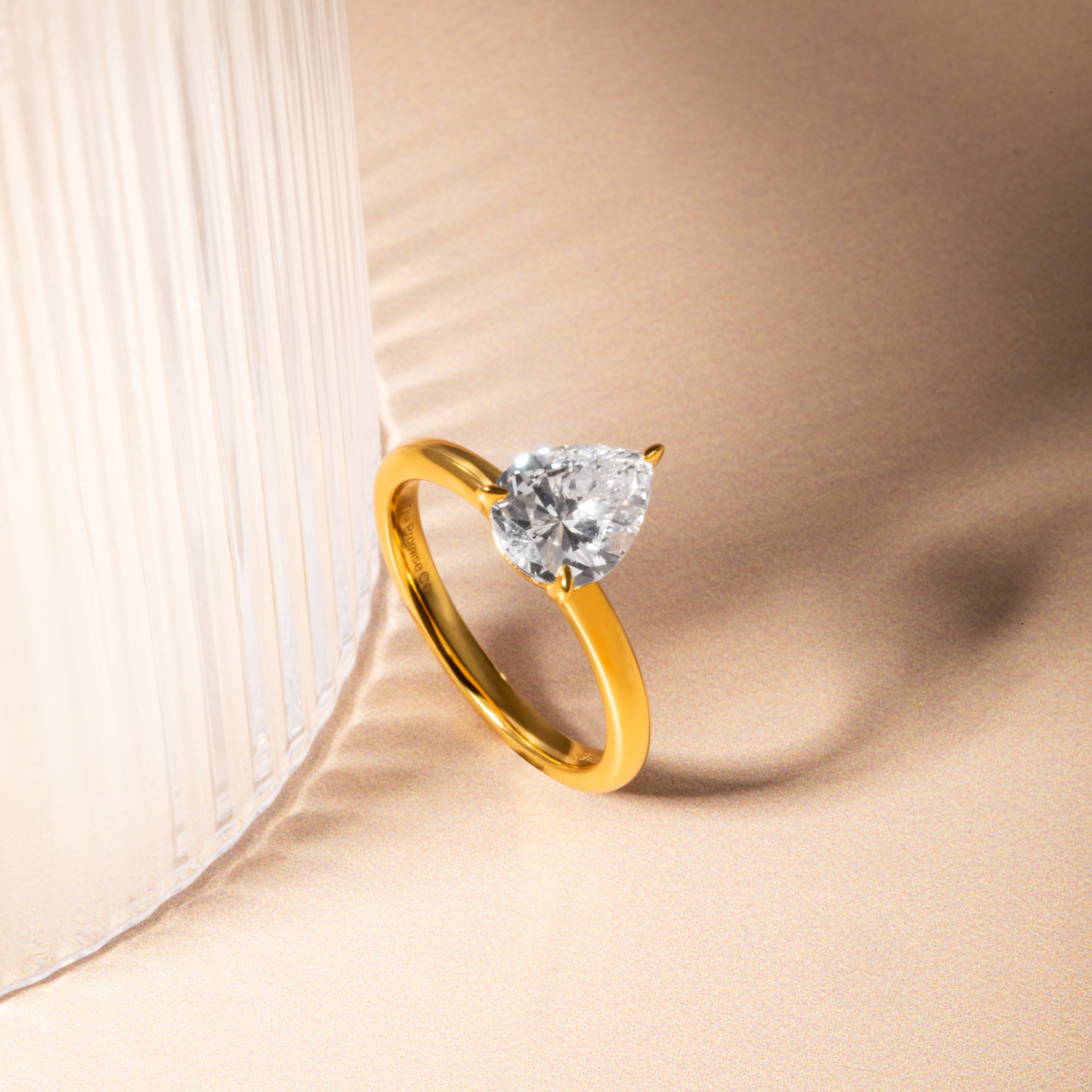 Promise Pear Cut Solitaire Ring